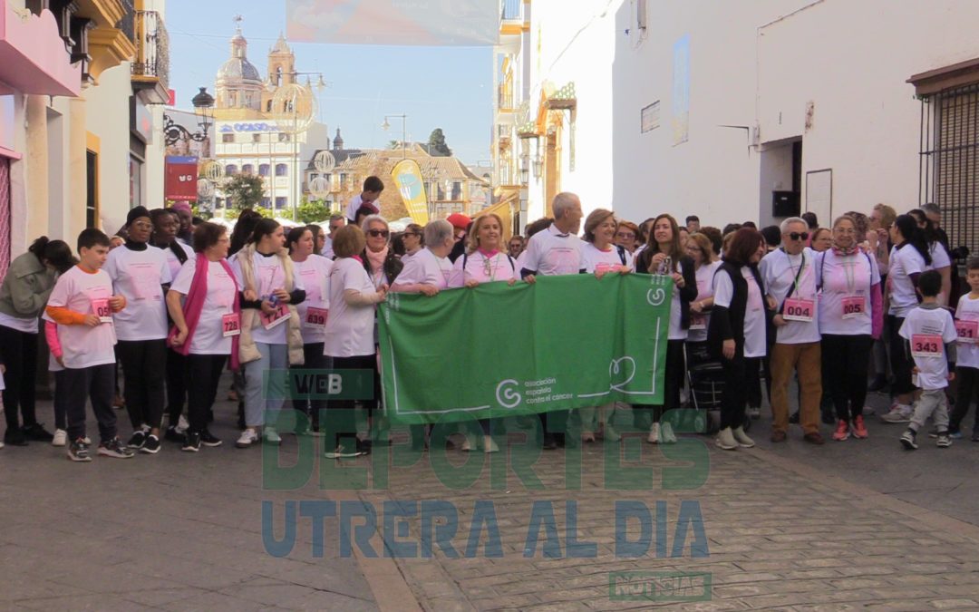 Centenares de personas partícipes de la II Marcha Benéfica contra el cáncer en Utrera [vídeo y fotos]