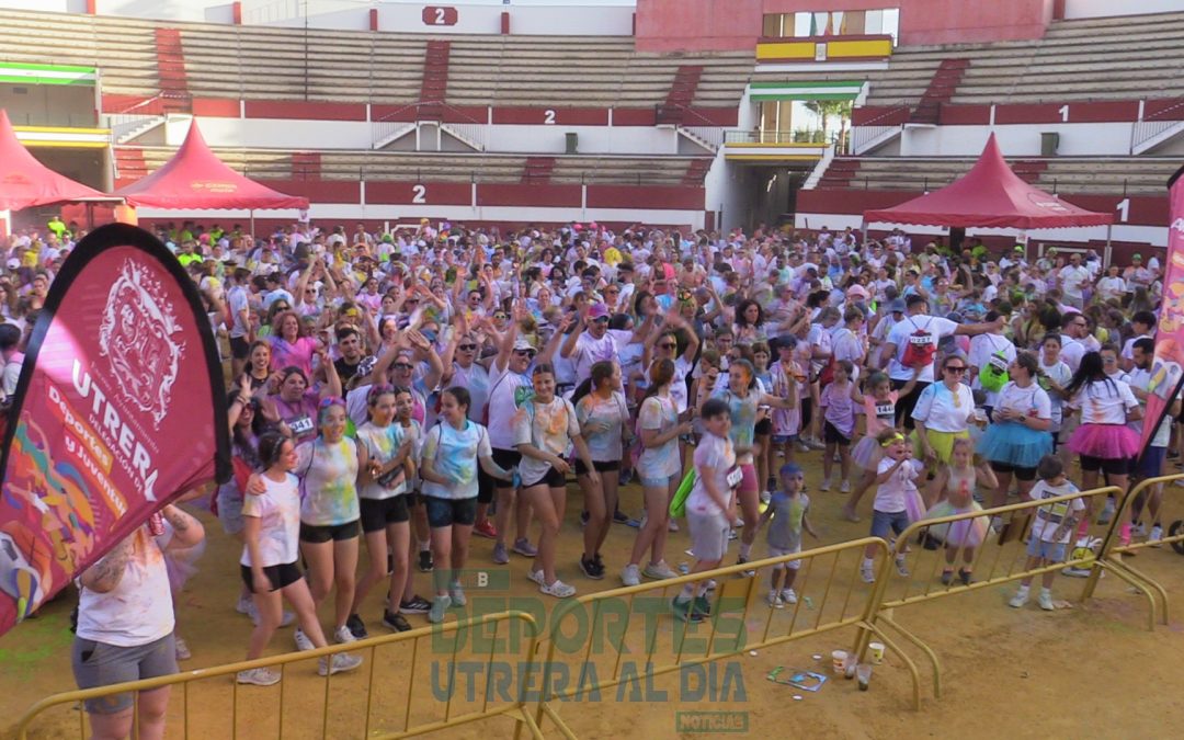 El arcoíris inunda la plaza de toros de Utrera para celebrar la V Carrera de Color (vídeo y galería)